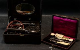 An Early to Mid 20th Century Ormand E1022 Electric Hair Dryer with a Bone Cased Manicure Set.