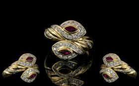 A Superb 18ct Gold Double Headed Snake Ring, Set with Diamond to Head with Ruby Set Eyes.