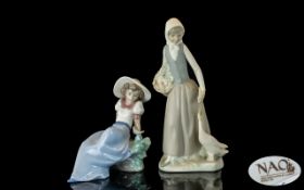 Two Nao Figurines, comprising No. 26 'Girl with Goose', measures 10" tall, and No.