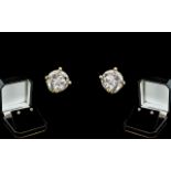 A Fine Pair of 18ct Gold Single Stone Diamond Set Earrings.