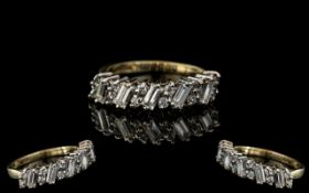 Ladies 9ct Gold Diamond Set Baguette and Brilliant Cut Diamond Ring. Full hallmark to shank.