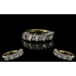 Ladies 9ct Gold Diamond Set Baguette and Brilliant Cut Diamond Ring. Full hallmark to shank.