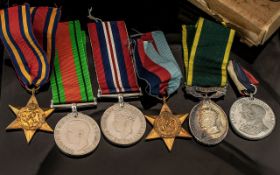 WWII Collection of Military Medals etc awarded to 885224 SJT FC Larence RA 1.