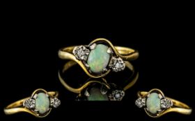Ladies 18ct Gold Illusion Set Diamond and Opal Ring. The Central Opal of Good Colour.