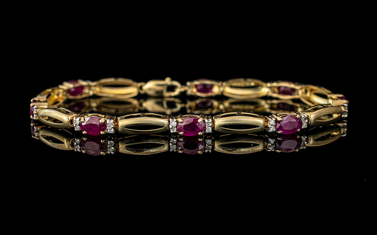 Ladies 9ct Gold Attractive Rubies and Diamond Set Line Bracelet. Marked 9ct and Diamonds. Weight 6.