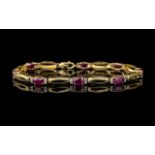 Ladies 9ct Gold Attractive Rubies and Diamond Set Line Bracelet. Marked 9ct and Diamonds. Weight 6.