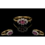 Ladies 9ct Gold Attractive Ruby And Diamond Set Ring Full Hallmark For 9.325. Ring Size M. Weight 2.