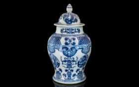 Large Chinese Blue & White Lidded Vase, heavily decorated in dragons, phoenix and precious items.