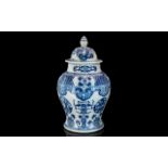 Large Chinese Blue & White Lidded Vase, heavily decorated in dragons, phoenix and precious items.