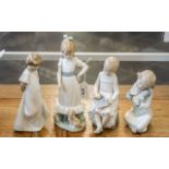 Four Nao Figurines, comprising a girl with a doll, Schoolgirl writing her ABC, Girl with Puppy,