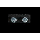 Blue Topaz Stud Earrings, 6cts of blue topaz over two solitaire, round cut stones,