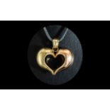 Large 14ct Two Tone Heart Pendant, unmarked, tests 14ct. Approx 1.75" x 1.75". Gross weight 11.