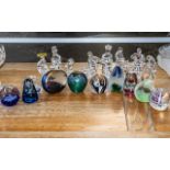 Quantity of Decorative Paper Weights, including a Caithness blue domed shape,