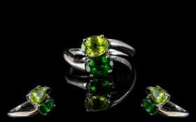 Ladies 9ct Yellow Gold Two Tone Peridot Ring on a twist.