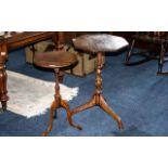 An Early 20th Century Oak Occasional Table Hexagonal Top Raised On A Turn Support With Three Legs.