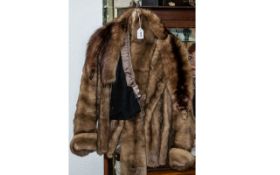 A Short Mink Jacket with Two Pelts, Labelled to Jacket 'Springs of Blackpool'.
