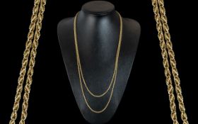 Antique Period - Superb 15ct Gold Muff Chain of Excellent Design and Length. Marked 15ct. c.1900.