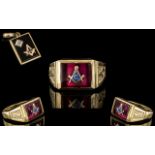 A 14ct Gold Masonic Signet Ring, top with red polished stone inset with set square in gold.