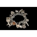 Excellent Quality - Vintage Sterling Silver Charm Bracelet Loaded with 18 Charms.