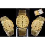 Longines - Gents 1980's Slim line Gold Tone Quartz Wrist Watch, With Integral Bracelet,