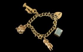 Ladies 9ct Gold Charm Bracelet With 4 Gold Charms - And Heart Shaped Gold Clasp and Safety Chain.