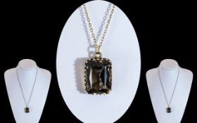 Attractive 9ct Gold Mounted Large Smokey Topaz Set Pendant With Attached Fancy 9ct Gold Chain