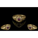 18ct Gold Antique Ruby & Diamond Ring, central Ruby surrounded by nine rosecut diamonds.