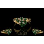 A 9ct Gold Emerald & Diamond Cluster Ring, fully hallmarked. Ring size P.