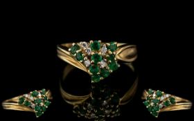 A 9ct Gold Emerald & Diamond Cluster Ring, fully hallmarked. Ring size P.