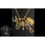 A Collection of 18ct Gold Egyptian Jewellery, either stamped or tested 18ct,