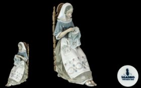 Lladro Large Handpainted Porcelain Figure 'Embroiderer', Model No. 4865. Issued 1974 - 1994.