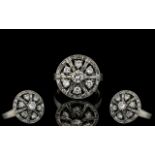A Fine Quality & Attractive White Gold Diamond Set Ring, of wheel design.