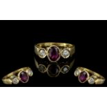 18ct Gold Attractive 3 Stone Ruby and Diamond Set Dress Ring.