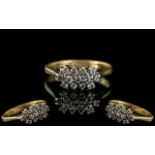 18ct Gold Diamond Cluster Ring, set with round modern brilliant cut diamonds, stamped 750.