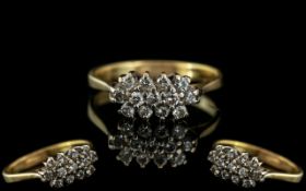 18ct Gold Diamond Cluster Ring, set with round modern brilliant cut diamonds, stamped 750.