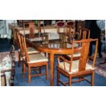 A Late 20th Century Mahogany Chinese Style Extending Table And Chairs Table Of Circular Form,