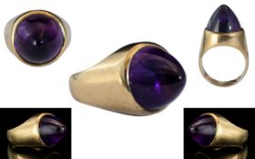9ct Gold Ring Set with a Rare Carved Brazilian Untreated Amethyst, carved by a master craftsman. A