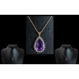 Ladies 9ct Gold Attractive Amethyst & Diamond Set Pear Drop Pendant with attached 9ct Gold Chain -