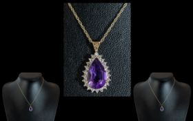 Ladies 9ct Gold Attractive Amethyst & Diamond Set Pear Drop Pendant with attached 9ct Gold Chain -