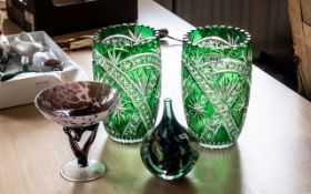 Collection of Coloured Glassware, comprising two green cut glass crystal vases with star
