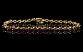 Ladies 9ct Gold Attractive Vintage Amethyst Set Line Bracelet, marked 9.375. Excellent condition.