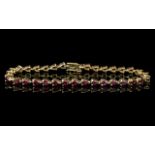 Ladies 9ct Gold Attractive Vintage Amethyst Set Line Bracelet, marked 9.375. Excellent condition.