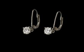 Platinum Pair Of Diamond Set Earrings - Marked 950,