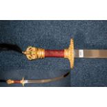 Decorative Oriental Style Fantasy Display Cutlass with dragon handle decorated in gold and red.
