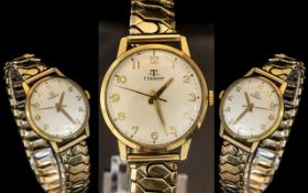 Tissot Gent's 9ct Gold Cased Mechanical Wind Wrist Watch with 9ct Gold front and back.