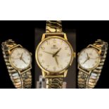 Tissot Gent's 9ct Gold Cased Mechanical Wind Wrist Watch with 9ct Gold front and back.