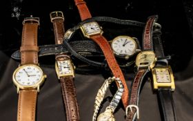 Collection of Eight Watches, comprising Accurist watch with date aperture and brown leather strap, a