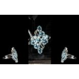 Sky Blue Topaz Cluster Ring, a design of oval cut sky blue topaz, totalling 5cts,