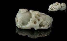 A Large Piece of White Jade in the form of an octupus of typical flora and good colour. Measures 4