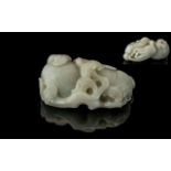 A Large Piece of White Jade in the form of an octupus of typical flora and good colour. Measures 4